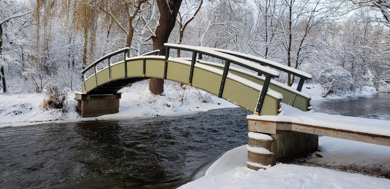 The original bridge in the backyard of the Wise residence on Grove street was torn away by ice jams that flooded the Fond du Lac River in 2019.