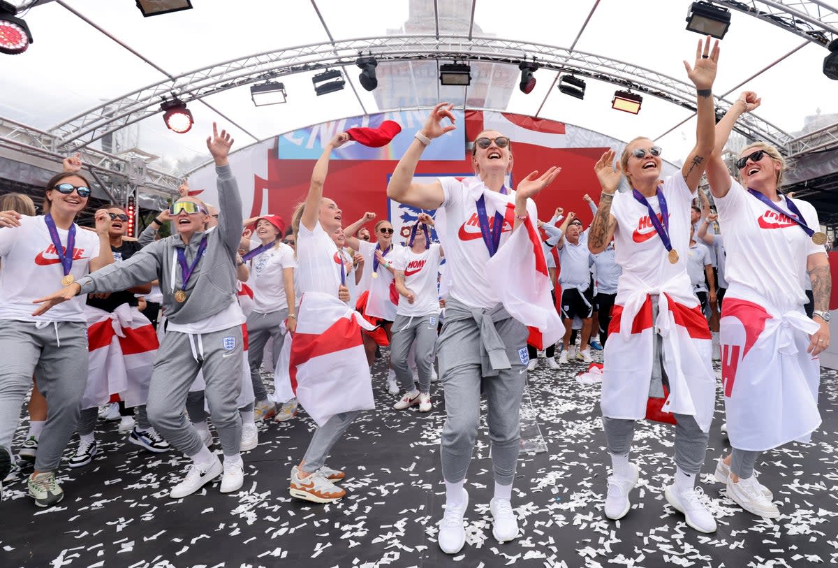 England players sing Sweet Caroline on stage during a fan celebration to commemorate England’s historic Uefa Women’s Euro 2022 triumph in Trafalgar Square, London (James Manning/PA) (PA Wire)