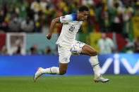 England's Jude Bellingham controls the ball during the World Cup round of 16 soccer match between England and Senegal, at the Al Bayt Stadium in Al Khor, Qatar, Sunday, Dec. 4, 2022. (AP Photo/Abbie Parr)