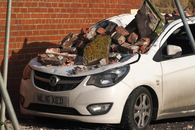 A car crushed by bricks