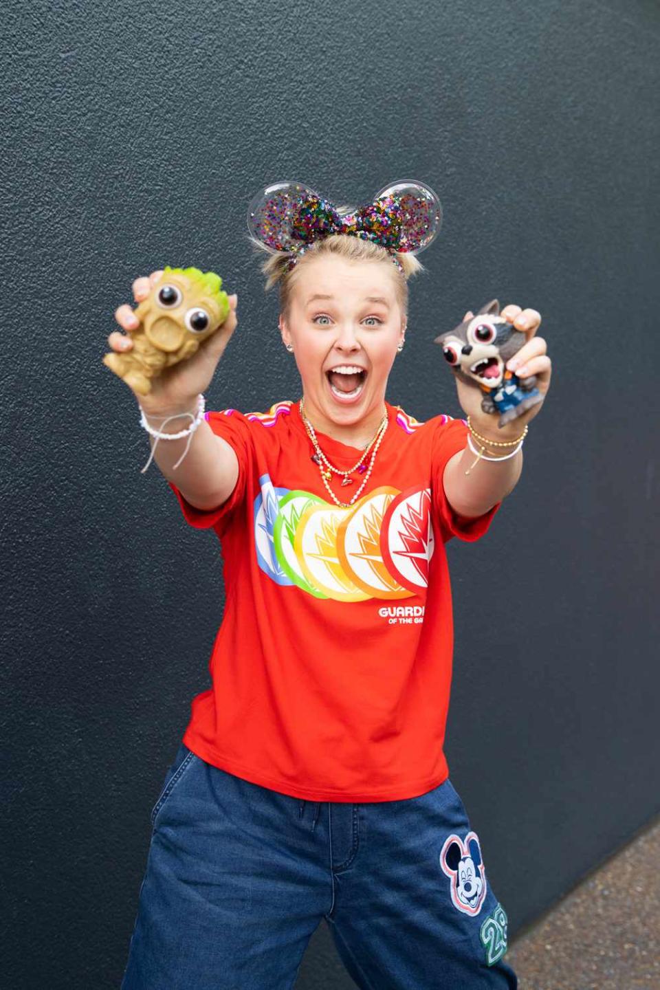 <p><a href="https://people.com/person/jojo-siwa/" rel="nofollow noopener" target="_blank" data-ylk="slk:JoJo Siwa;elm:context_link;itc:0;sec:content-canvas" class="link ">JoJo Siwa</a> was smiling from Mickey Mouse ear to Mickey Mouse ear while visiting Walt Disney World in Florida! The star went to <a href="https://www.instagram.com/p/CdMhri_LTQm/?utm_source=ig_web_copy_link" rel="nofollow noopener" target="_blank" data-ylk="slk:check out the new Guardians of the Galaxy: Cosmic Rewind ride at EPCOT;elm:context_link;itc:0;sec:content-canvas" class="link ">check out the new Guardians of the Galaxy: Cosmic Rewind ride at EPCOT</a>.</p> <p>On Thursday, the <em><a href="https://people.com/tag/dance-moms/" rel="nofollow noopener" target="_blank" data-ylk="slk:Dance Moms;elm:context_link;itc:0;sec:content-canvas" class="link ">Dance Moms</a></em> alum <a href="https://people.com/music/jojo-siwa-back-together-girlfriend-kylie-prew/" rel="nofollow noopener" target="_blank" data-ylk="slk:shared photos with ex-girlfriend Kylie Prew;elm:context_link;itc:0;sec:content-canvas" class="link ">shared photos with ex-girlfriend Kylie Prew</a> while there. Siwa, 18, planted a kiss on Prew's cheek in the first pic in front of the Cinderella Castle, confirming the pair is back together.</p>