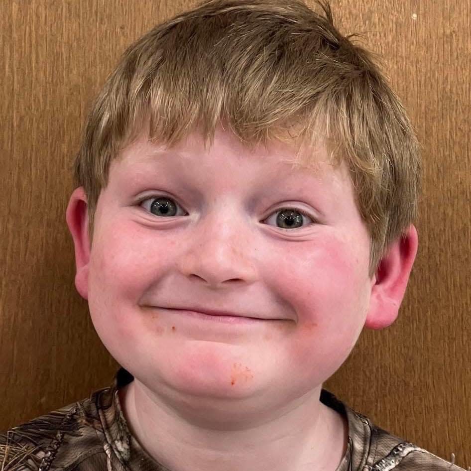 Justin Gilstrap, 11, smiles for a photo prior to the attack.