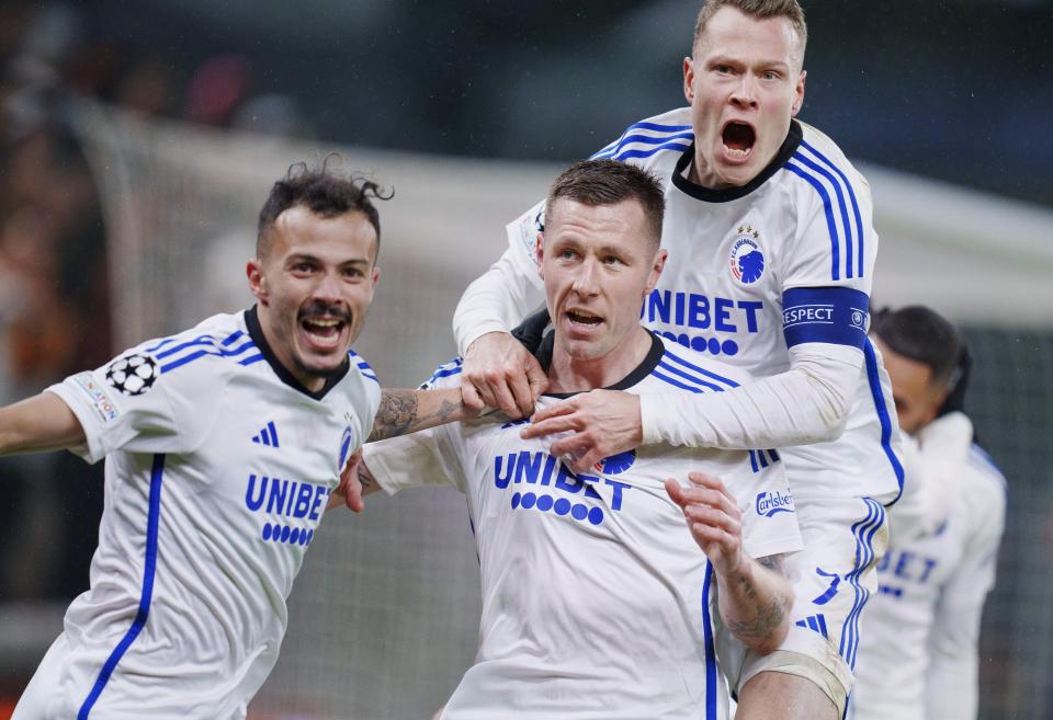 FC Copenhagen's Lukas Lerager, center, scores a goal 1-0, and celebrates with Diogo Goncalves, left, and Viktor Claesson, during the Champions League Group A soccer match between FC Copenhagen and Galatasaray, at the Parken Stadium, in Copenhagen, Tuesday, Dec. 12, 2023. (Liselotte Sabroe/Ritzau Scanpix via AP)