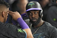 Tampa Bay Rays Randy Arozarena, right, celebrates his solo home run off New York Mets relief pitcher Dedniel Nunez with Isaac Paredes during the fourth inning of a baseball game Friday, May 3, 2024, in St. Petersburg, Fla. (AP Photo/Chris O'Meara)