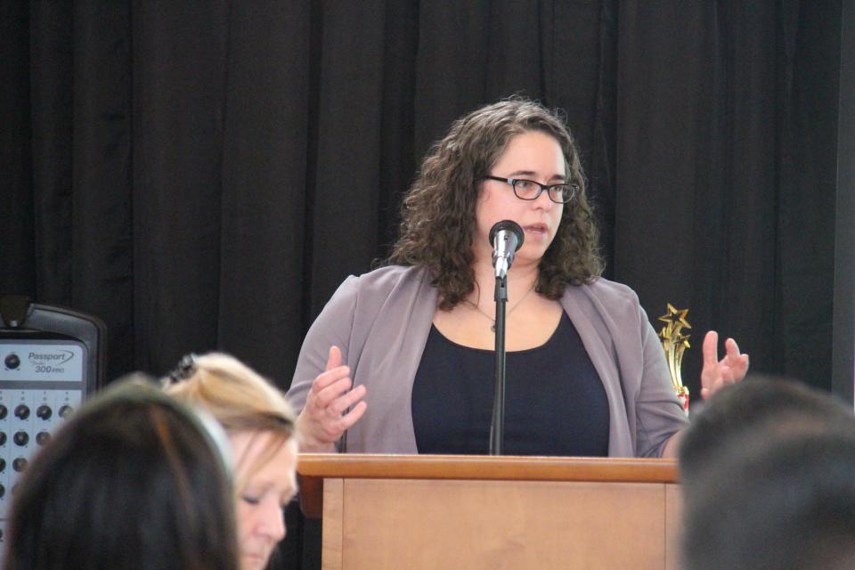 Lynsi Pasutti, executive director of the Perry Chamber of Commerce, speaks during the chamber's annual dinner on Tuesday, April 4, 2023, at La Poste.