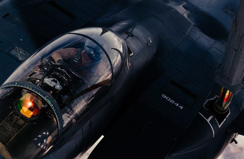 A F-15E Strike Eagle refuels from a 908th Expeditionary Aerial Refueling Squadron KC-10 Extender in support of Operation Inherent Resolve, March 17, 2019.