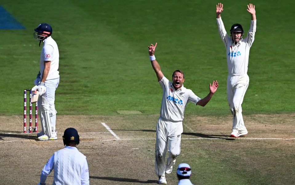 New Zealand's Neil Wagner, center, celebrates the wicket of England's James Anderson, left, for the win by 1 run on day 5 of their cricket test match - Andrew Cornaga/Photosport via AP