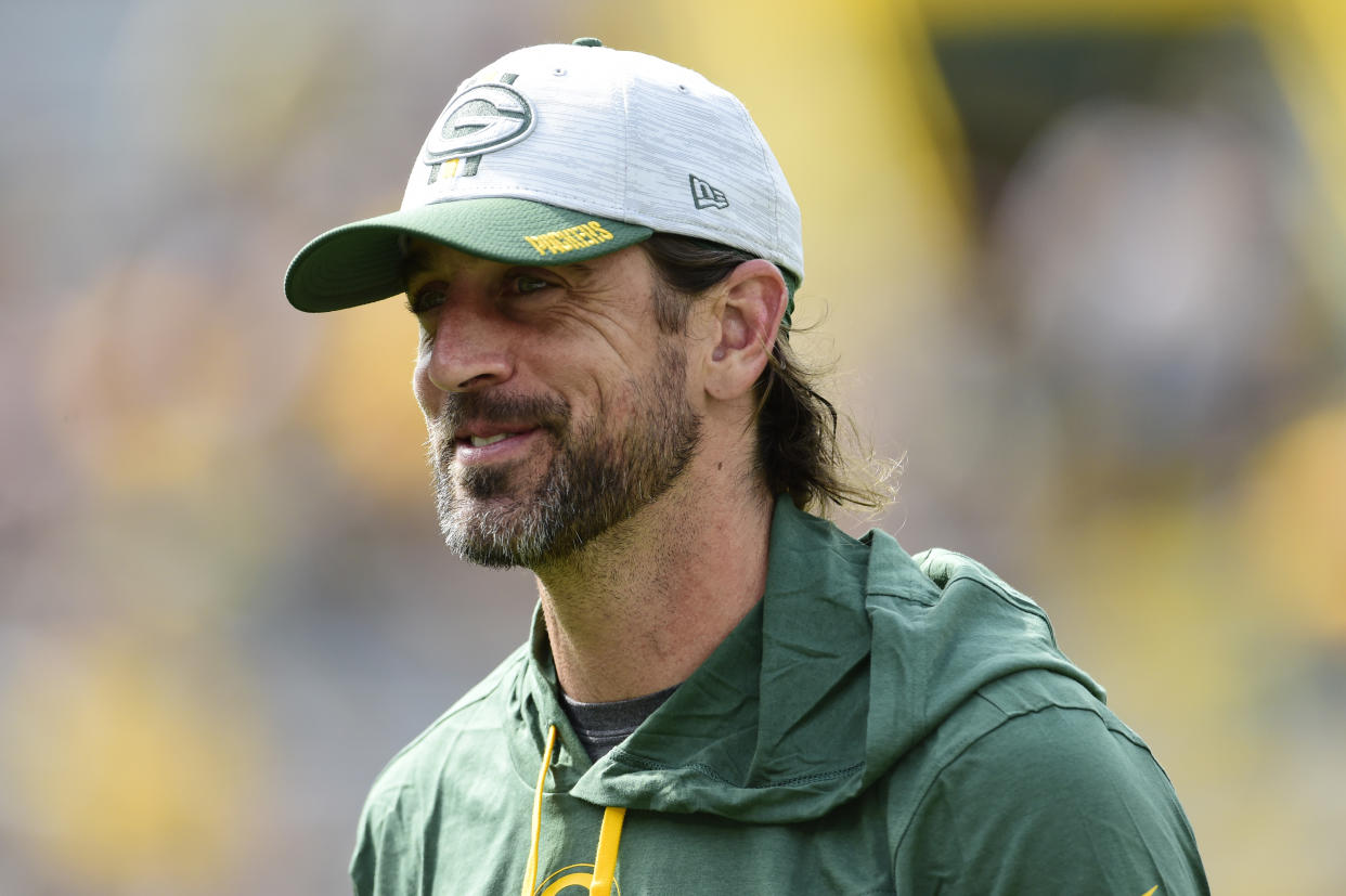 GREEN BAY, WISCONSIN - AUGUST 21: Aaron Rodgers #12 of the Green Bay Packers looks on during warmups before a preseason game against the New York Jets at Lambeau Field on August 21, 2021 in Green Bay, Wisconsin. (Photo by Patrick McDermott/Getty Images)