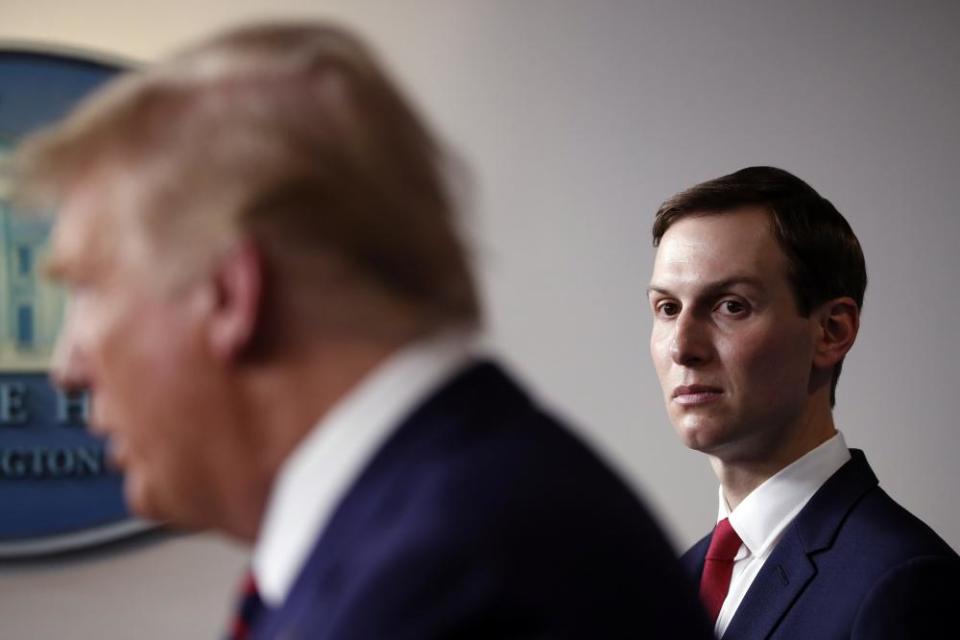 White House adviser Jared Kushner listens Donald Trump speaks about the coronavirus in the press briefing room at the White House.