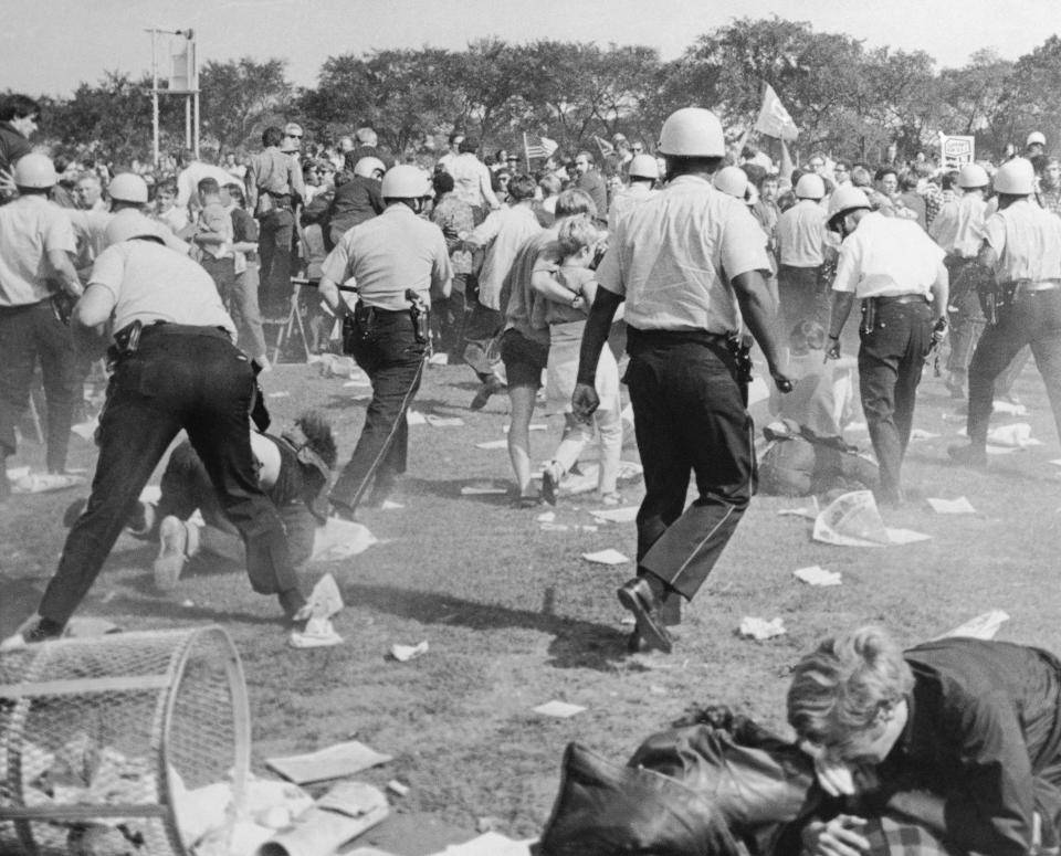 FILE - Police reroute demonstrators as they try to clear Grant Park during the Democratic National Convention in Chicago on Aug. 28, 1968. As pro-Palestinian demonstrations escalate on college campuses around the country, critics of President Joe Biden’s handling of the Israel-Hamas war suggest this summer’s 2024 Democratic National Convention could be marred by protests and scenes of chaos that undermine his reelection. It raises the specter of a replay of 1968’s Democratic convention , where a violent police crackdown created indelible scenes of chaos. (AP Photo)