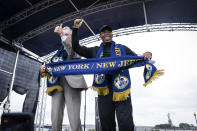New Jersey Gov. Phil Murphy, left, and New York City Mayor Eric Adams speak at the 2026 FIFA World Cup host city selection watch party at Liberty State Park in Jersey City, N.J., Thursday, June 16, 2022. (AP Photo/Stefan Jeremiah)