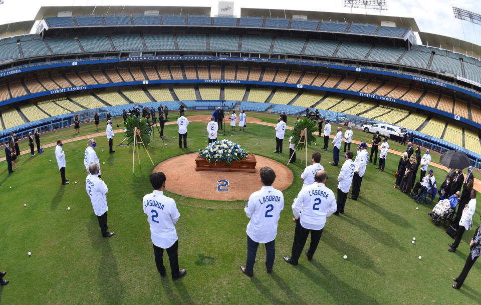 In this photo provided by the Los Angeles Dodgers, the casket of Hall of Fame manager Tommy Lasorda is seen on the mound during a ceremony at Dodger Stadium, Tuesday, Jan. 19, 2021, in Los Angeles. (Jon SooHoo/Los Angeles Dodgers via AP)