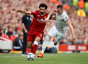 <p>Liverpool’s Mo Salah goes past Phil Jones</p>