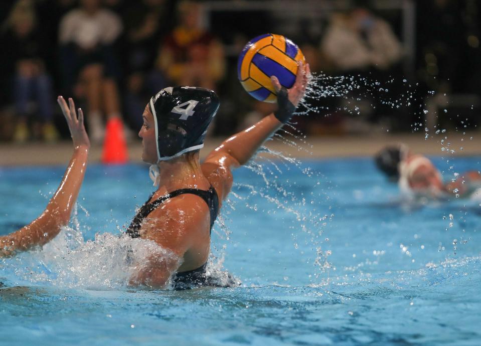 Maggie Benson of Xavier Prep shoots and scores against Palm Desert in the Desert Empire League title match in Cathedral City, Calif., Feb. 2, 2023. 