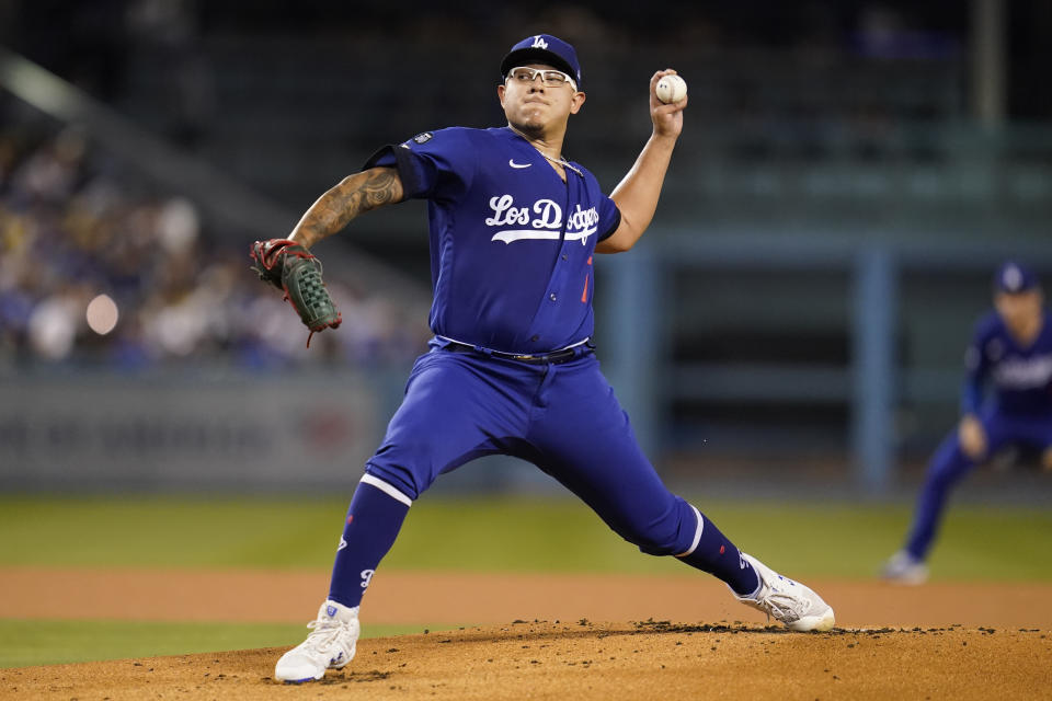 Los Angeles Dodgers starting pitcher Julio Urias (7) throws during the first inning of a baseball game against the Arizona Diamondbacks in Los Angeles, Thursday, Sept. 22, 2022. (AP Photo/Ashley Landis)