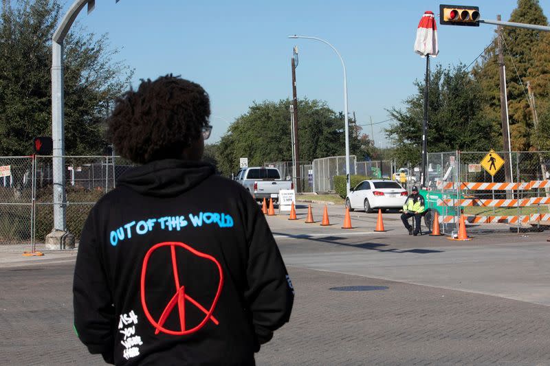 FILE PHOTO: Police block an entrance to NRG Park the morning after a deadly crush of fans in Houston