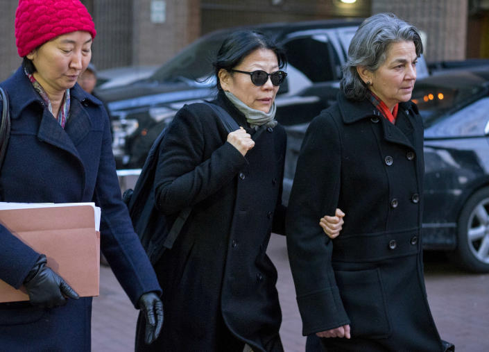 Sheri Yan, CEO of the Global Sustainability Foundation, center, leaves federal court in New York City on Jan. 20, 2016, after she pleaded guilty in connection with a scheme to bribe John Ashe, the former U.N. General Assembly president. (Photo: Craig Ruttle/AP)