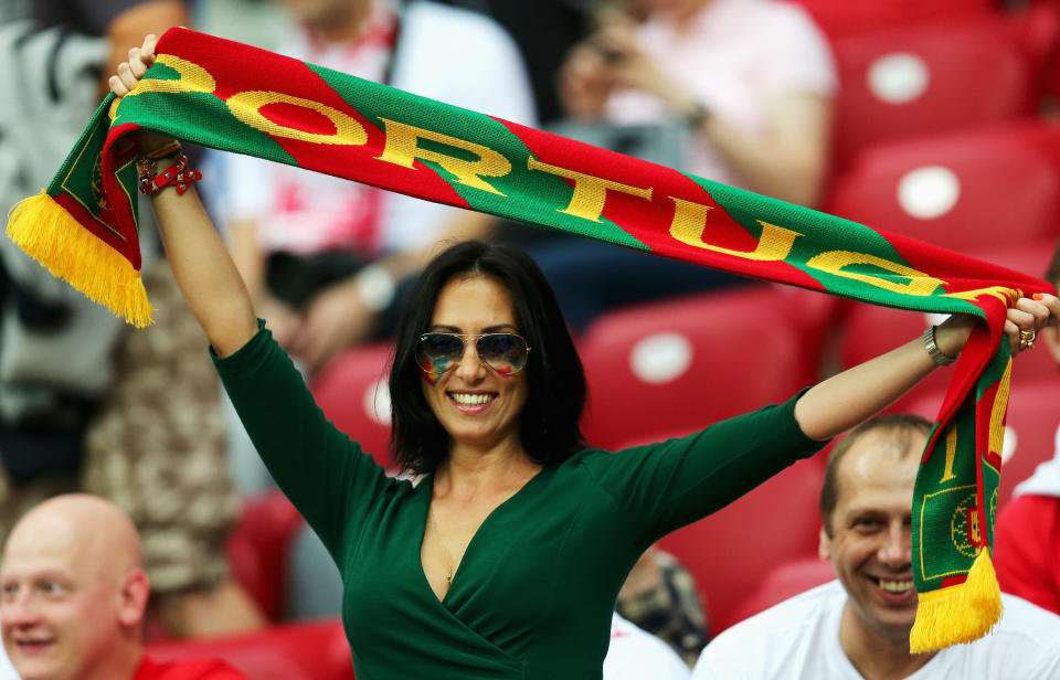 WARSAW, POLAND - JUNE 21: A Portugal fan enjoys the atmosphere ahead of the UEFA EURO 2012 quarter final match between Czech Republic and Portugal at The National Stadium on June 21, 2012 in Warsaw, Poland. (Photo by Alex Grimm/Getty Images)