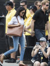 <p>Meghan Markle made her first public appearance with Prince Harry at a tennis match during the Invictus Games. The actress proved she wasn’t quite ready for royal life as she donned a white shirt (strangely called ‘The Husband’), ripped jeans and tan leather flats.<br>[Photo: Getty] </p>