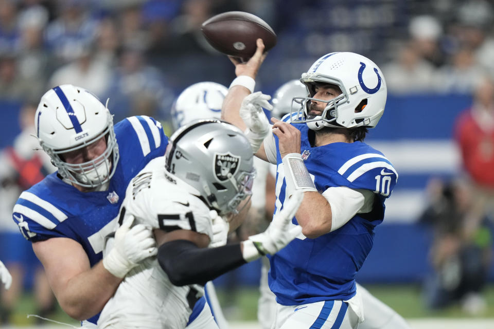Indianapolis Colts quarterback Gardner Minshew (10) throws a pass during the second half of an NFL football game against the Las Vegas Raiders, Sunday, Dec. 31, 2023, in Indianapolis. (AP Photo/AJ Mast)