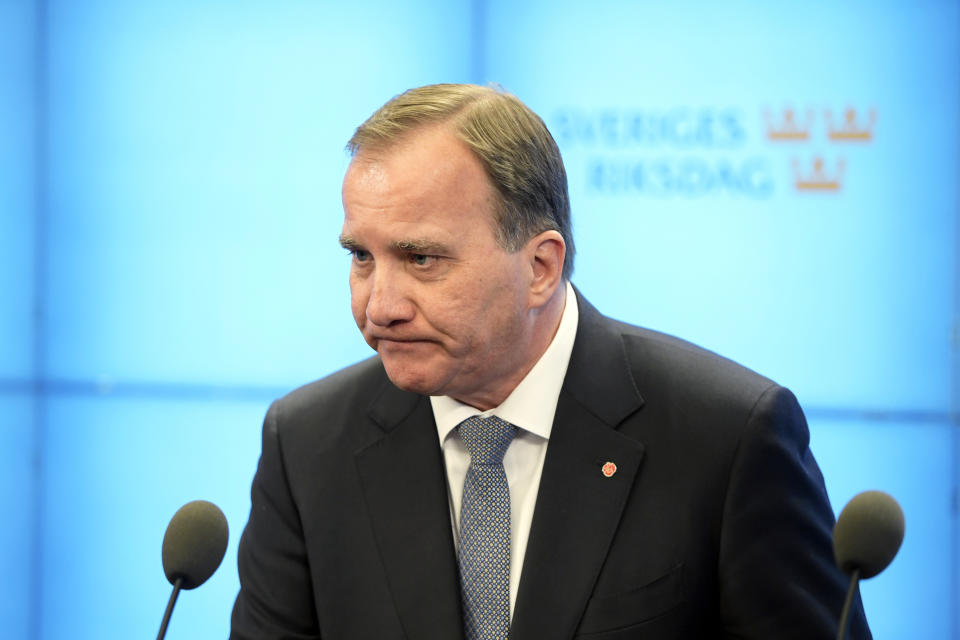 Swedish Prime Minister Stefan Lofven speaks to the media after losing a vote of confidence in the Swedish Parliament Riksdagen, Tuesday Sept. 25, 2018. Stefan Lofven, the leader of the Social Democratic Party, will continue as caretaker prime minister until a new government can be formed. (Anders Wiklund/TT via AP)