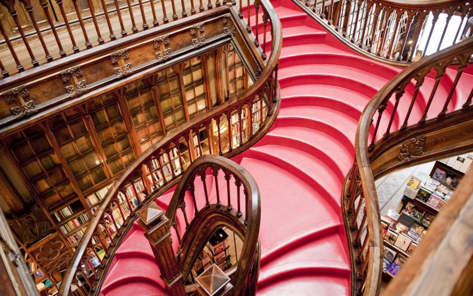 Ornate staircase in Lello bookstore - Maremagnum/The Image Bank Unreleased