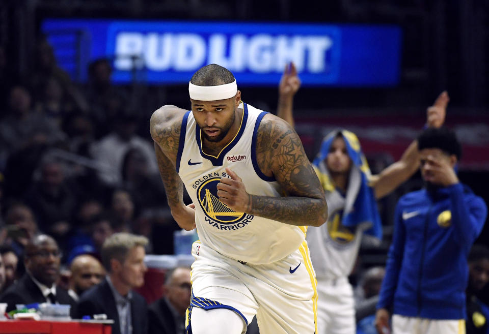 DeMarcus Cousins sprints up the court against the Clippers on Friday night. (Getty)