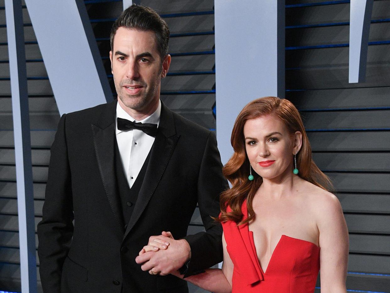 Sacha Baron Cohen (L) and Actress Isla Fisher attend the 2018 Vanity Fair Oscar Party hosted by Radhika Jones at Wallis Annenberg Center for the Performing Arts on March 4, 2018 in Beverly Hills, California