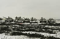 FILE - Russian tanks T-72B3 take part in drills at the Kadamovskiy firing range in the Rostov region in southern Russia, Jan. 12, 2022. Amid a buildup of Russian troops near Ukraine, Moscow has denied planning an attack on Ukraine but urged the U.S. and its allies to provide a binding pledge that NATO won't expand to Ukraine and won't deploy military assets there _ a demand rejected by the West. (AP Photo, File)