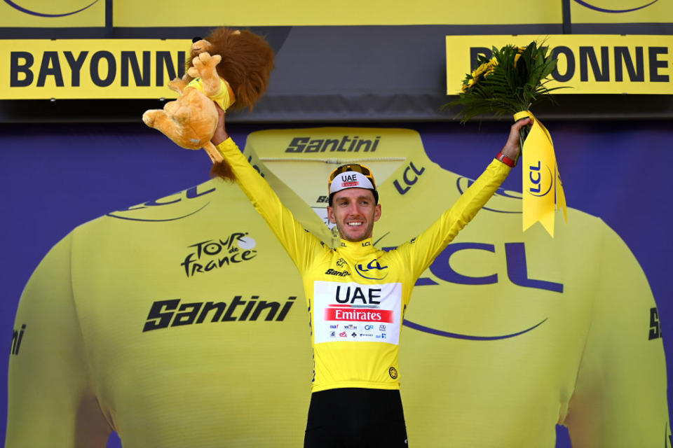 BAYONNE FRANCE  JULY 03 Adam Yates of United Kingdom and UAE Team Emirates celebrates at podium as Yellow leader jersey winner during the stage three of the 110th Tour de France 2023 a 1935km stage from AmorebietaEtxano to Bayonne  UCIWT  on July 03 2023 in Bayonne France Photo by Tim de WaeleGetty Images