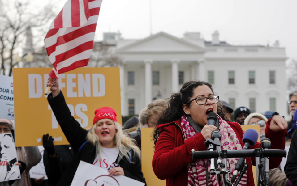 <p>Celina Benitez, who was born in El Salvador and migrated with my family to the U.S. as a young child and is now a U.S. Citizen, speaks during a rally held by CASA de Maryland, an immigration advocacy and assistance organization, in Lafayette Park, across from the White House in Washington, Monday, Jan. 8, 2018, in reaction to the announcement regarding Temporary Protective Status for people from El Salvador. (Photo: Pablo Martinez Monsivais/AP) </p>