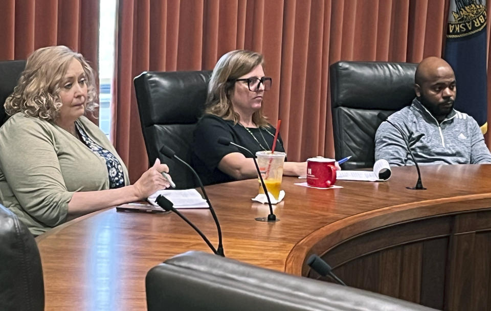 Nebraska Sens. Carole Blood, Machaela Cavanaugh and Terrell McKinney, left to right, listen to those who attended a public forum at the Nebraska Capitol, intended to counter an Education Committee hearing geared toward questioning social-emotional learning, or SEL, in public schools, Monday, July 31, 2023, in Lincoln, Neb. The concept, which teaches students how to manage their emotions and make good decisions, has become a lightning rod among conservatives who say schools use it to promote progressive ideas about race, gender and sexuality. (AP Photo/Margery Beck)