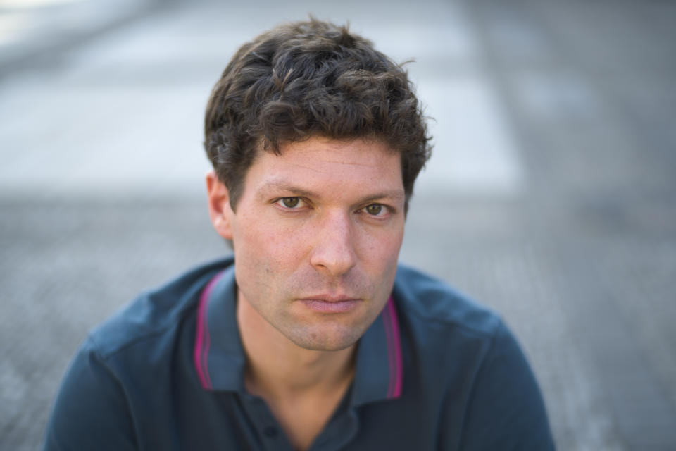 Author and journalist Ronen Steinke poses for a portrait in Berlin, Germany, Wednesday, Sept. 23, 2020. Ronen Steinke wrote the book 'Terror against Jews' where he demanded authorities increase security for Jews and their institutions in Germany. (AP Photo/Markus Schreiber)