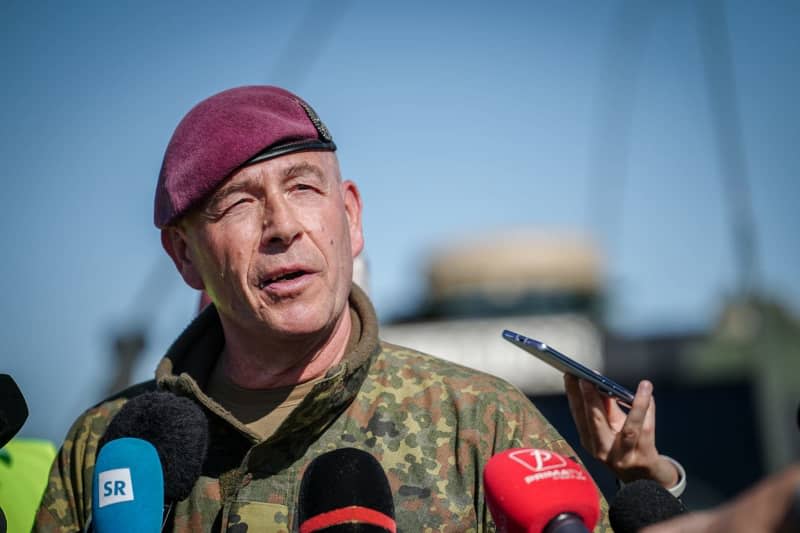 Major General Dirk Faust from the Rapid Forces Division speaks about the Swift Response airborne exercise at the 71st Airbase. NATO allies are practising rapid military response here with paratroopers from Germany and other NATO states, having taken off from Hungary and moving to Romania. Kay Nietfeld/dpa