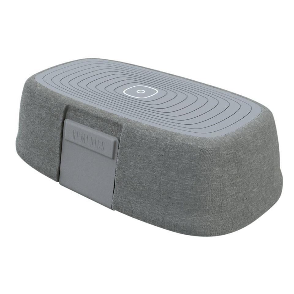 A wireless charging station with a fabric finish and a prominent brand logo