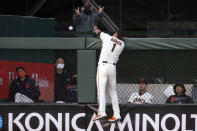 San Francisco Giants infielder Mauricio Dubón (1) leaps in vain for a two-run home run hit by Cincinnati Reds' Jesse Winker during the third inning of a baseball game, Monday, April 12, 2021, in San Francisco. (AP Photo/D. Ross Cameron)