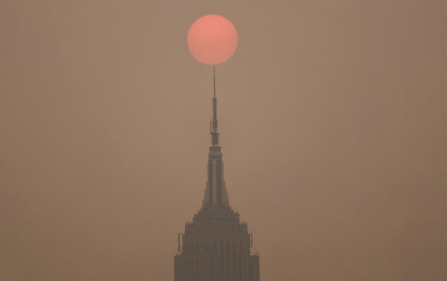 NYC landmarks are blanketed in smoke pouring across the Northeast from  Canadian wildfires