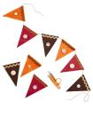 <p>Decorate the dining room with this easy-as-pie craft.</p><p><strong>Make the Garland:</strong> Cut triangles from brown, orange, and burgundy felt. Attach a length of rickrack with hot-glue to create the “crust.” Add a button “dollop” in the center of the triangle with hot-glue. Attach twine to the backs with hot-glue for hanging.</p><p><a class="link " href="https://www.amazon.com/flic-flac-inches-Assorted-Fabric-Patchwork/dp/B01GCRXBVE/ref=sr_1_1_sspa?tag=syn-yahoo-20&ascsubtag=%5Bartid%7C10050.g.2063%5Bsrc%7Cyahoo-us" rel="nofollow noopener" target="_blank" data-ylk="slk:SHOP FELT;elm:context_link;itc:0;sec:content-canvas">SHOP FELT</a></p>