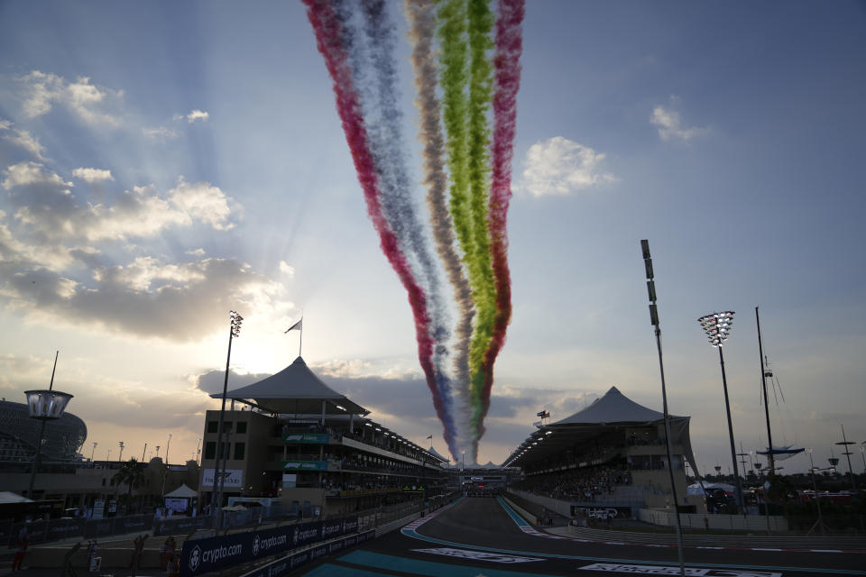 Aircraft fly over the track bbefore the Formula One Abu Dhabi Grand Prix in Abu Dhabi, United Arab Emirates, Sunday, Dec. 12. 2021. (AP Photo/Hassan Ammar)