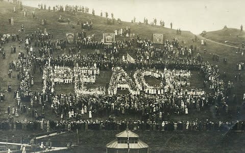 The original picture from 1919 in which residents of Ilfracombe spell out the word 'peace' - Credit: Apex News and Pictures