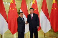 Chinese President Xi Jinping shakes hands with Indonesia's Vice President Jusuf Kalla before the bilateral meeting of the Second Belt and Road Forum at the Great Hall of the People, in Beijing, China April 25, 2019. Andrea Verdelli/Pool via REUTERS *** Local Caption *** BEIJING, CHINA - APRIL 25: Egypt President Abdel Fattah El-Sisi talks to Chinese President Xi Jinping (not pictured) during a bilateral meeting of the Second Belt and Road Forum at the Great Hall of the People on April 25, 2019 in Beijing, China. (Photo by