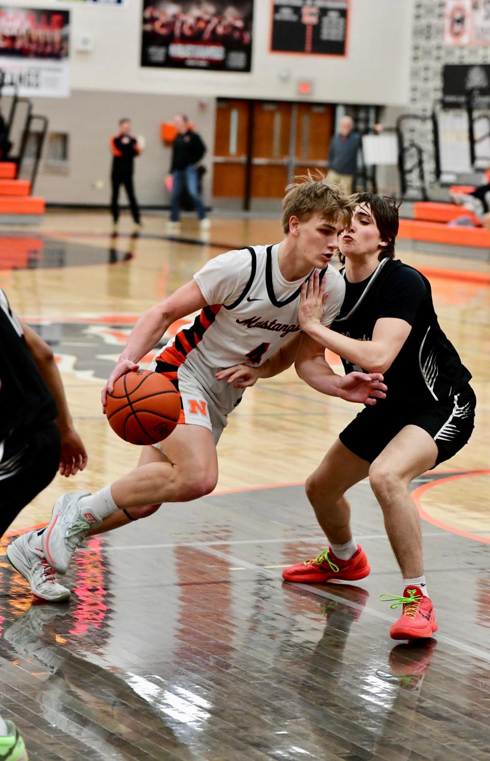 Northville's Kaden Kuban dribbles to the hoop during a Kensington Lakes Activities Association-West boys basketball game on Friday, Feb. 16, 2024.