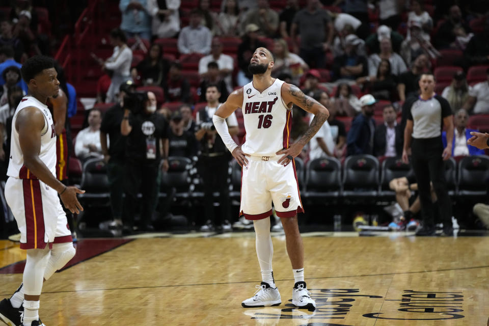 Miami Heat forward Caleb Martin (16) reacts at the end of the team's loss to the Atlanta Hawks in an NBA basketball play-in tournament game Tuesday, April 11, 2023, in Miami. (AP Photo/Rebecca Blackwell)