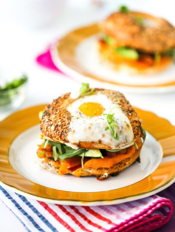 <p>SaltyCanary.com</p><p>Perfect breakfast for a slow Sunday morning! </p><p><strong>Get the recipe: <a href="https://www.saltycanary.com/egg-hole-breakfast-bagel-sandwich/" rel="nofollow noopener" target="_blank" data-ylk="slk:Egg in a Hole Breakfast Bagel Sandwich;elm:context_link;itc:0;sec:content-canvas" class="link ">Egg in a Hole Breakfast Bagel Sandwich</a></strong></p>