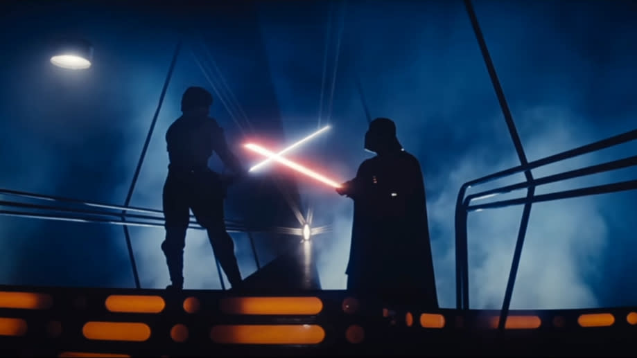 Luke Skywalker and Darth Vader engaged in a lightsaber duel