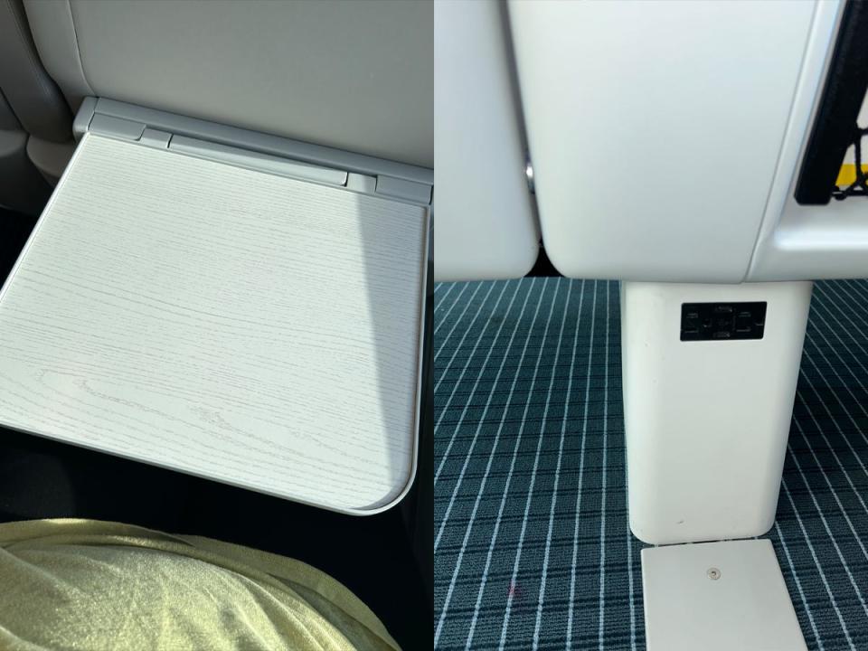 tray table next to outlets under chair