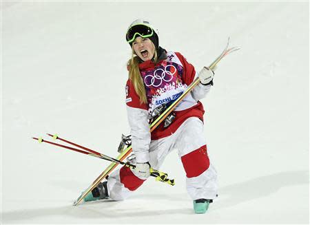 Canada's Justine Dufour-Lapointe reacts in the finish area during the women's freestyle skiing moguls final competition at the 2014 Sochi Winter Olympic Games in Rosa Khutor, February 8, 2014. REUTERS/Dylan Martinez