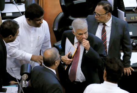 Sri Lanka's ousted Prime Minister Ranil Wickremesinghe looks on as he leaves the parliament in Colombo, Sri Lanka November 19, 2018. REUTERS/Dinuka Liyanawatte