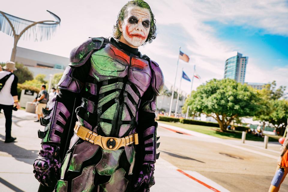 A Joker cosplayer dressed as Batman at San Diego Comic-Con 2022.