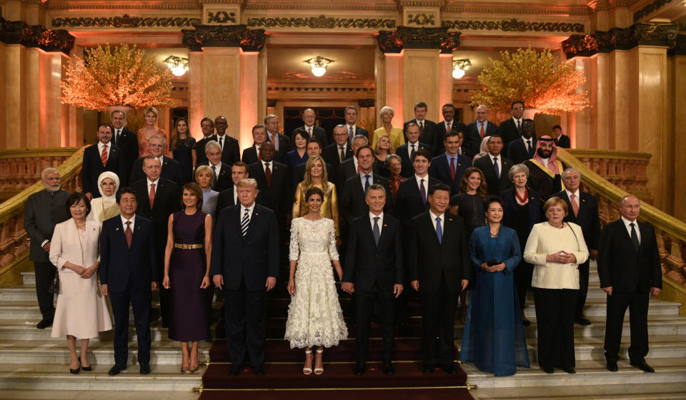 G20 leaders and their partners pose for a photo at the Colon Theatre during a gala at the G20 leaders summit in Buenos Aires, Argentina, Nov. 30, 2018. (Photo: G20 Argentina/Handout via Reuters)